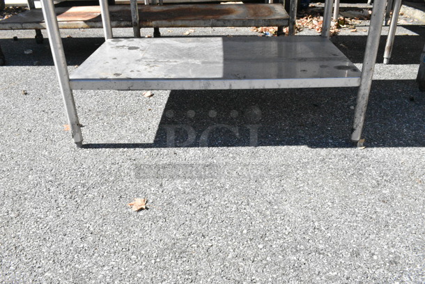 Stainless Steel Table w/ Metal Under Shelf and Back Splash. (out back) - Image 2 of 2