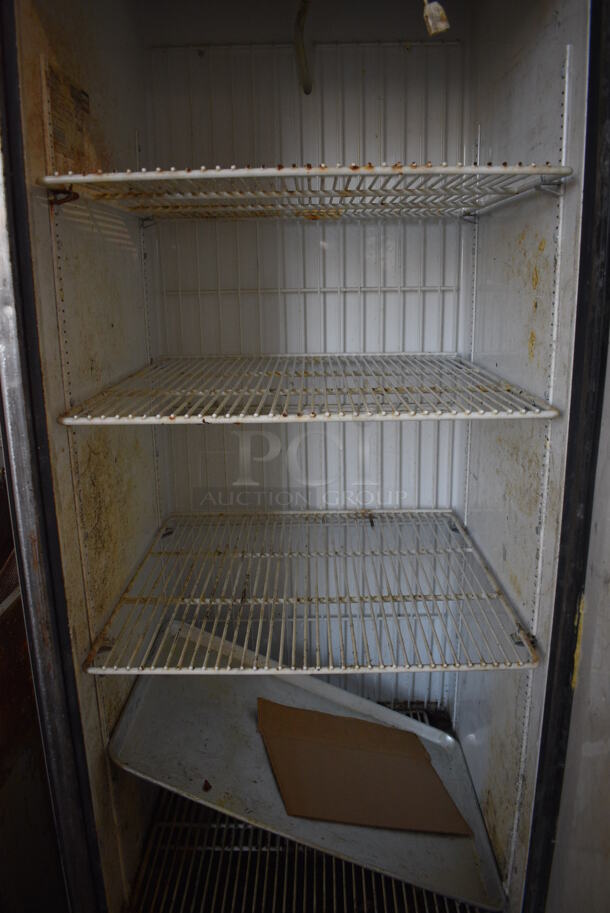 True Model T-23F Stainless Steel Commercial Single Door Reach In Freezer w/ Poly Coated Racks on Commercial Casters. 115 Volts, 1 Phase. 27x30x83. Tested and Powers On But Temps at 31 Degrees - Image 4 of 5