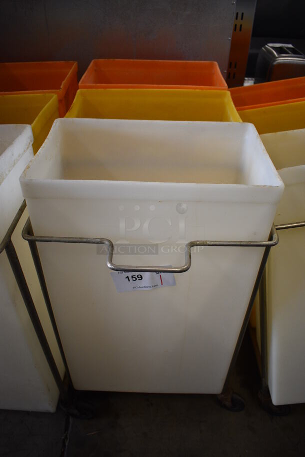 Three Poly Ingredient Bins; White, Yellow and Orange in Metal Frame on Commercial Casters. No Lids. 15x32x28