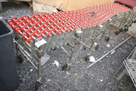 Nestaflex Metal Roller Expandable Conveyor Belt on Commercial Casters. 