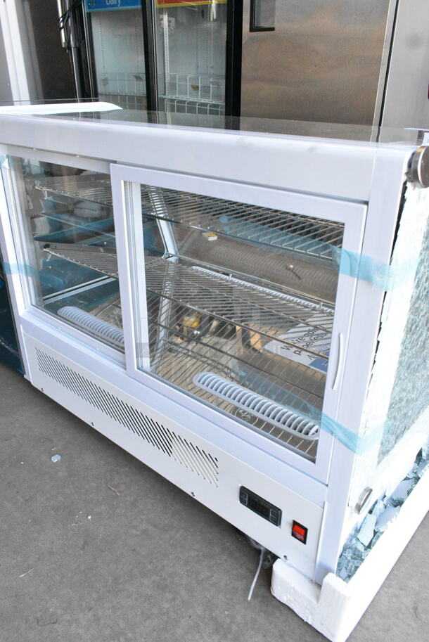 BRAND NEW SCRATCH AND DENT! Avantco 360BCC35HCW 34 1/5" White Refrigerated Countertop Bakery Display Case with LED Lighting. See Pictures for Broken Glass. 115 Volts, 1 Phase. Tested and Working! - Image 7 of 10