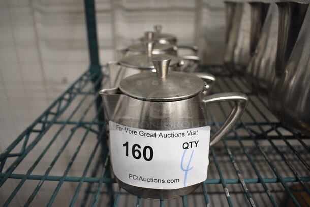 4 Metal Pitchers w/ Lid. 6x4x4.5. 4 Times Your Bid! - Image 1 of 2