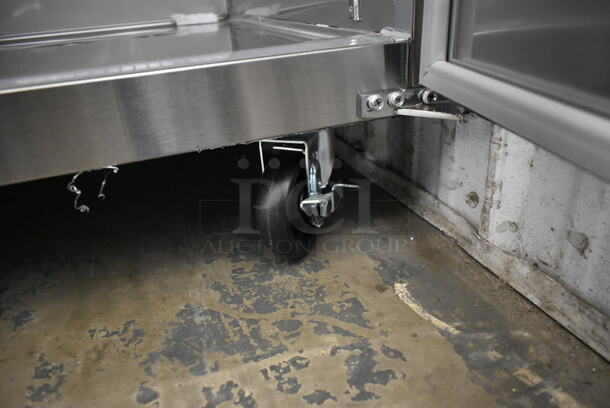 BRAND NEW SCRATCH AND DENT! 2023 Avantco 178SSPPT3 Stainless Steel Commercial Pizza Prep Table on Commercial Casters. 115 Volts, 1 Phase. Tested and Working! - Image 10 of 11