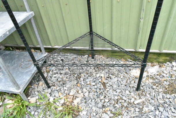 Black Finish 2 Tier Corner Wire Shelving Unit. BUYER MUST DISMANTLE. PCI CANNOT DISMANTLE FOR SHIPPING. PLEASE CONSIDER FREIGHT CHARGES. - Image 2 of 3