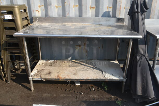 Stainless Steel Commercial Table w/ Back Splash and Metal Under Shelf. - Image 1 of 4