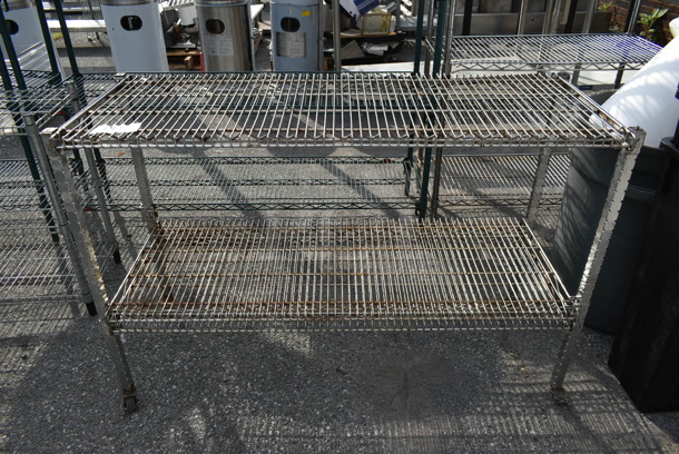 Chrome Finish 2 Tier Wire Shelving Unit. BUYER MUST DISMANTLE. PCI CANNOT DISMANTLE FOR SHIPPING. PLEASE CONSIDER FREIGHT CHARGES.
 - Image 1 of 2