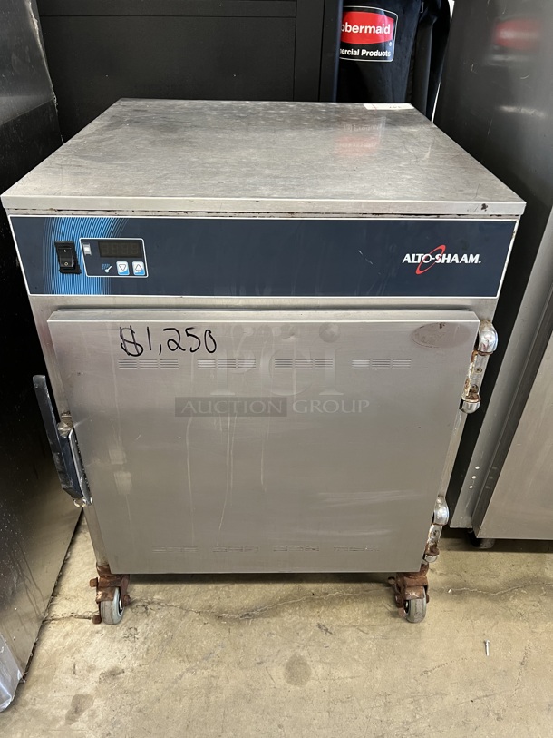 2014 Alto Shaam Model 750-S/PT Stainless Steel Commercial Pass Through Warming Cabinet on Commercial Casters. 120 Volts, 1 Phase. 26x28x34. Tested and Working!