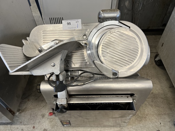 Globe Model 775 Stainless Steel Commercial Countertop Automatic Meat Slicer w/ Blade Sharpener. 115 Volts, 1 Phase. 24x18x21. Tested and Working!