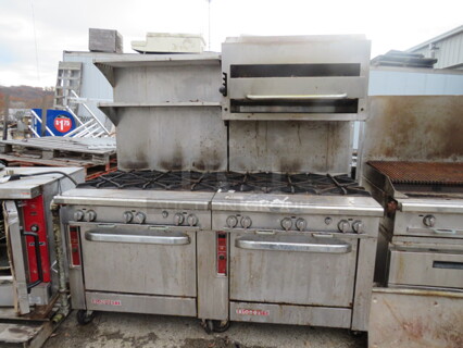 One Blodgett 10 Burner Natural Gas Range With 2 Over Shelves And Salamander On Casters. 72X38X73