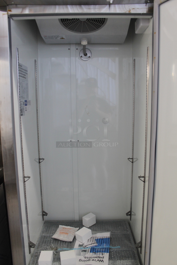 BRAND NEW SCRATCH AND DENT! 2023 Avantco 178A19FHC Stainless Steel Commercial Single Door Reach In Freezer w/ Poly Coated Racks. 115 Volts, 1 Phase. Tested and Working! - Image 3 of 5