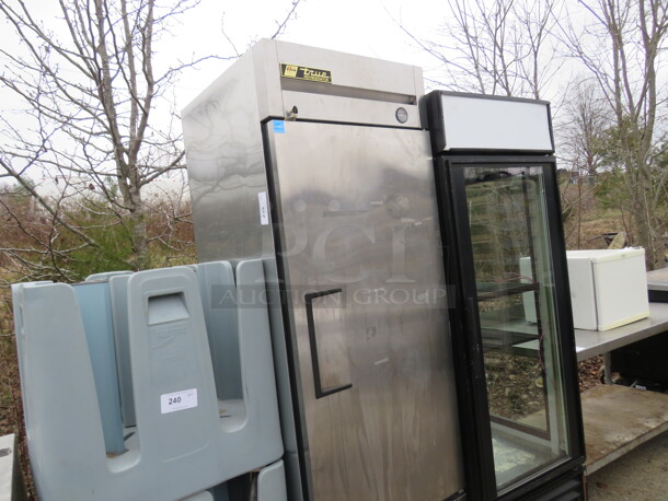 One True 1 Door Refrigerator With 3 Racks On Casters, With Key. Working NOT COLD! 115 Volt. Model# T-23. 27X30X83