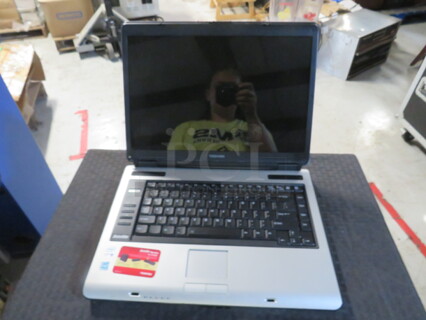 One Toshiba Laptop.