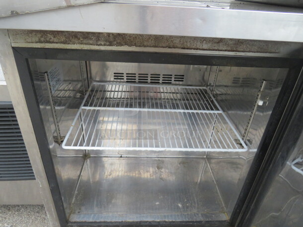 One Stainless Steel 1 Door Delfield Under Counter Refrigerator With 1 Rack, On Casters. Model#UR27. 115 Volt. 27.5X30X36 - Image 2 of 2