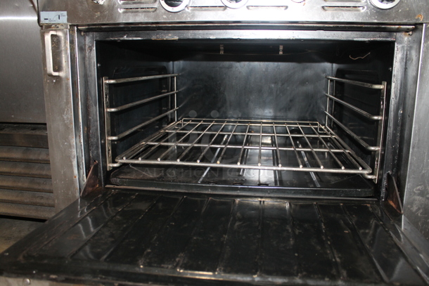 Garland M47R Stainless Steel Commercial Natural Gas Powered Flat Top Griddle w/ Oven, Over Shelf and Back Splash. - Image 4 of 9