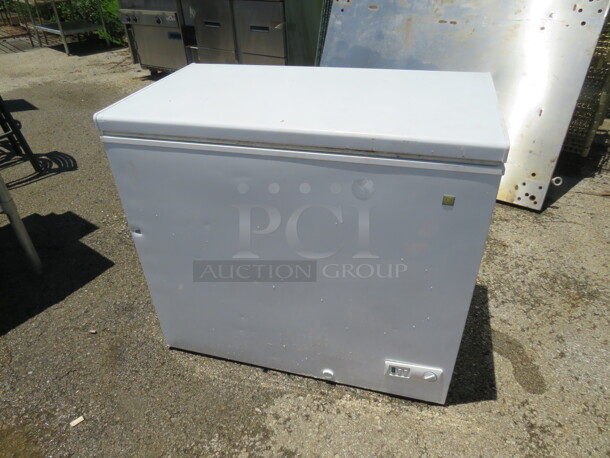 One General Electric Chest Freezer. 115 Volt. WORKING WHEN REMOVED. Model# FCM7SUFWW. 37X22X33 - Image 1 of 2