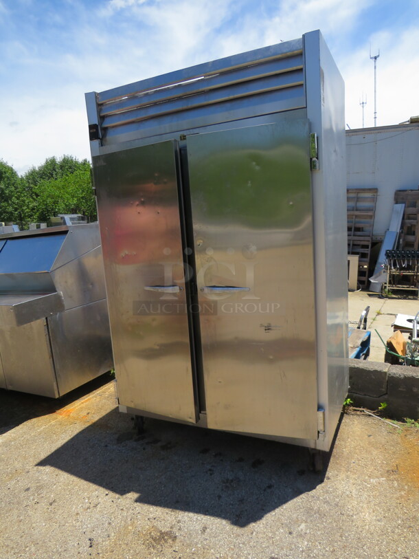 One Traulsen 2 Door Freezer With 6 Racks On Casters. WORKING WHEN REMOVED. 115 Volt. Model# G22010. 52.5X32X83.5 - Image 2 of 3
