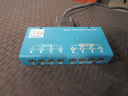One Dman 2044 Midiman Break Out Box. 