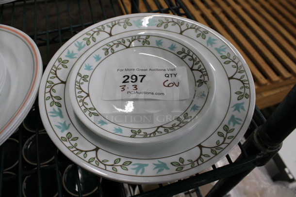 6 Various Sized White Ceramic Plates w/ Tree and Bird Patterned Rim. 10.5x10.5x1, 7x7x1. 6 Times Your Bid!