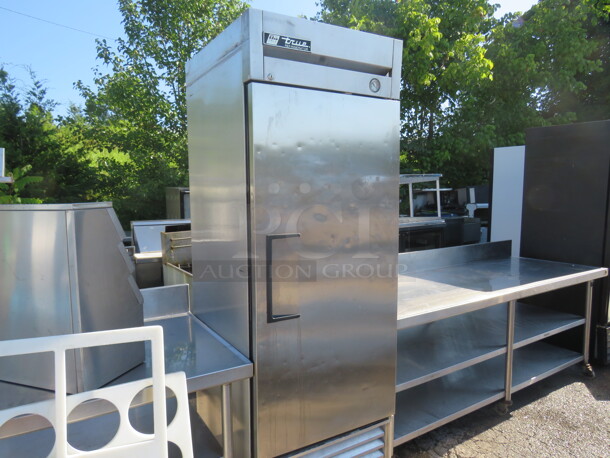 One WORKING True 1 Door Refrigerator On Casters. Model# T-23. 115 Volt. 27X29.5X83 - Image 1 of 3