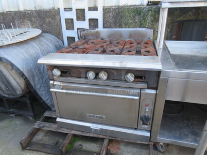 One Vulcan Natural Gas 6 Burner Range With 2 Racks. Unable To Test. 36X37X35