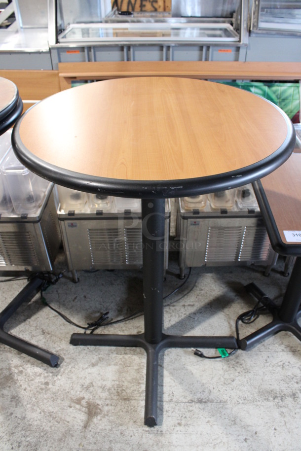 Round Wood Pattern Bar Height Table w/ Black Rim on Black Metal Table Base. Stock Picture - Cosmetic Condition May Vary. 30x30x42