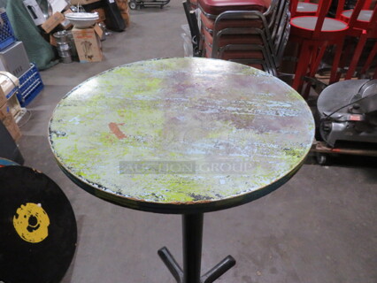 One 24X24X342 Abstract Round Painted  Table Top On A Bar Height Pedestal Base. 