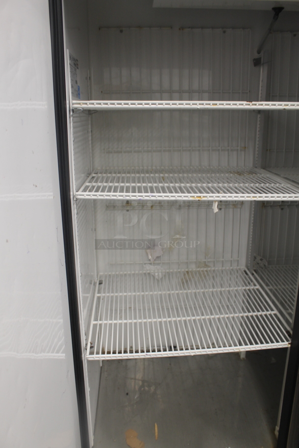 2013 True T-49F ENERGY STAR Stainless Steel Commercial Two Door Reach In Freezer w/ Poly Coated Racks on Commercial Casters. 115 Volts, 1 Phase. Tested and Working! - Image 5 of 7