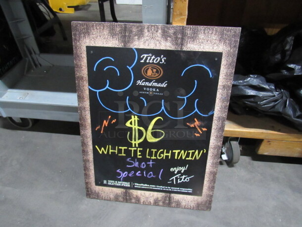 One 18X24 Titos Chalkboard. - Image 1 of 1