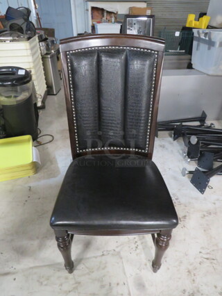 Wooden Chairs With Black Cushioned Seat And Back With Nail Head Trim. 4XBID