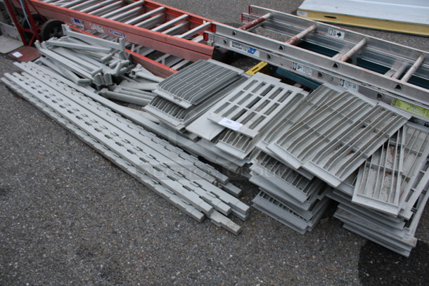 ALL ONE MONEY! Lot of Gray Poly Shelf Pieces and 11 Poles! Makes At Least 2 Shelving Units. Parts May Be Missing - Image 1 of 3