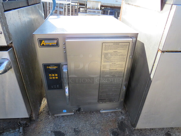 One Accutemp Evolution Boilerless Steamer. 208 Volt. 3 Phase. Model# E62083D15000250. 23X26X28.5