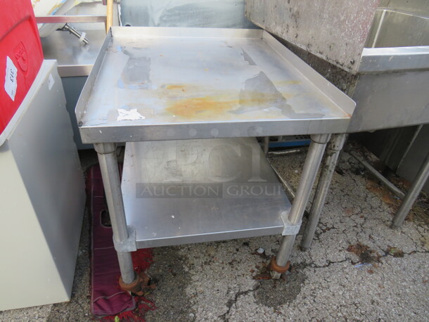 One Stainless Steel Table With SS Under Shelf, On Casters. 24.5X28.5X31