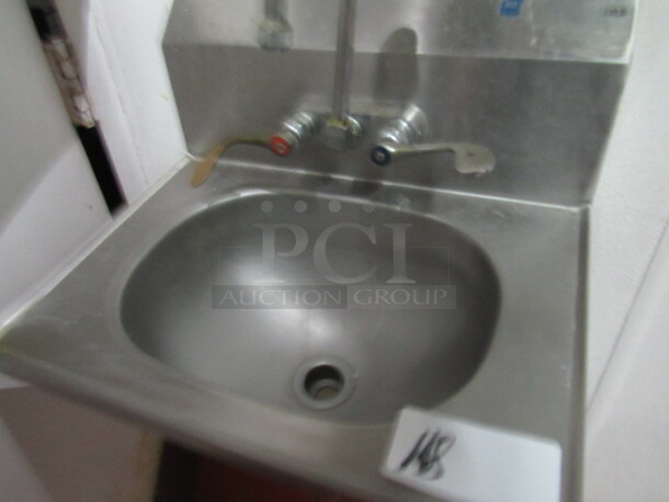 One Wall Mount Stainless Steel Hand Sink With Faucet. 19X15. BUYER MUST REMOVE