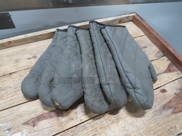 One Lot Of Oven Mitts.
