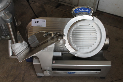 BRAND NEW SCRATCH AND DENT! Globe Chefmate GC512 Stainless Steel Commercial Countertop 12" Manual Gravity Feed Slicer w/ Blade Sharpener. 115 Volts, 1 Phase. Tested and Working!