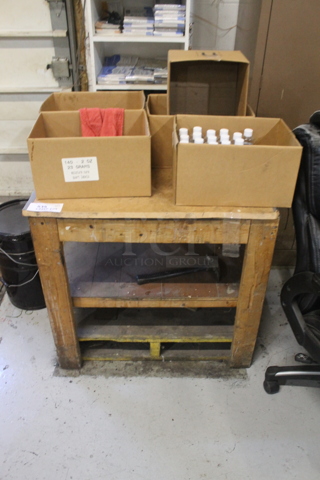 Wooden Counter w/ Contents and Under Shelf.