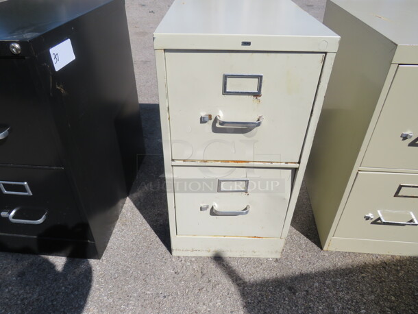 One Hon 2 Drawer Metal File Cabinet. 15X25X29