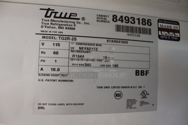 2015 True TG2R-2S ENERGY STAR Stainless Steel Commercial Two Door Reach In Cooler w/ Poly Coated Racks on Commercial Casters. 115 Volts, 1 Phase. Tested and Working! - Image 9 of 9