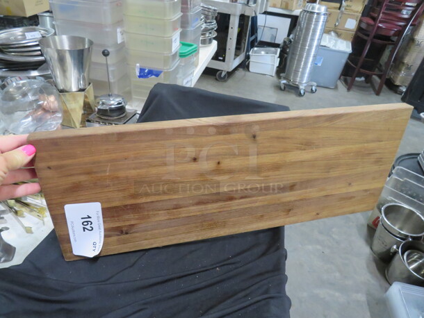 One 9X24 Wooden Cutting Board. 