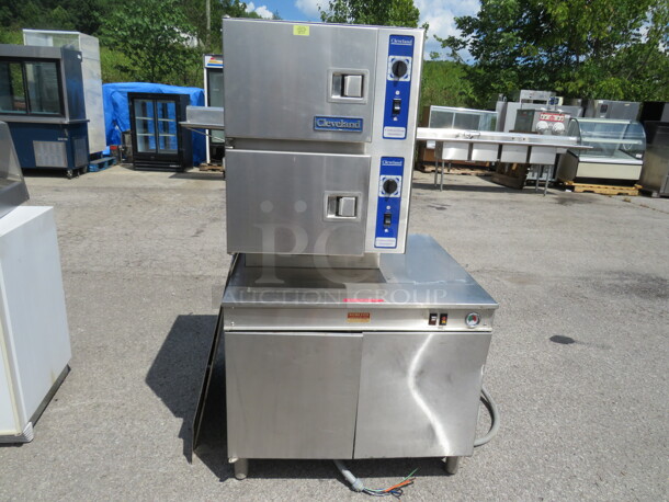 One Cleveland 2 Door Convection Steamer On Stand. 35.5X33.5X62.5