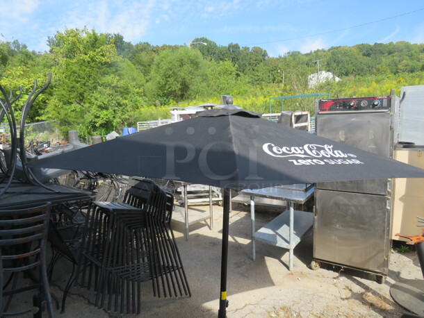 One Coca Cola Patio Umbrella.  - Image 1 of 2