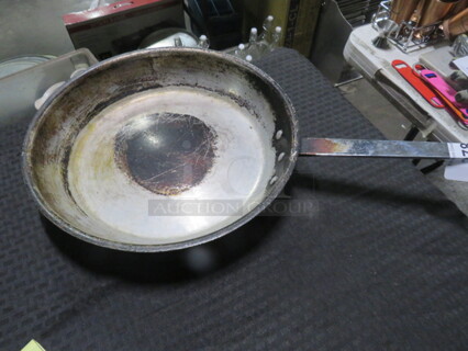 One 14.5 Inch Superior Fry Pan. 