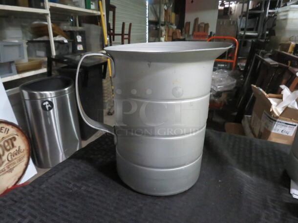 One Vollrath 4 Quart Aluminum Measurer. #68352 - Image 1 of 2