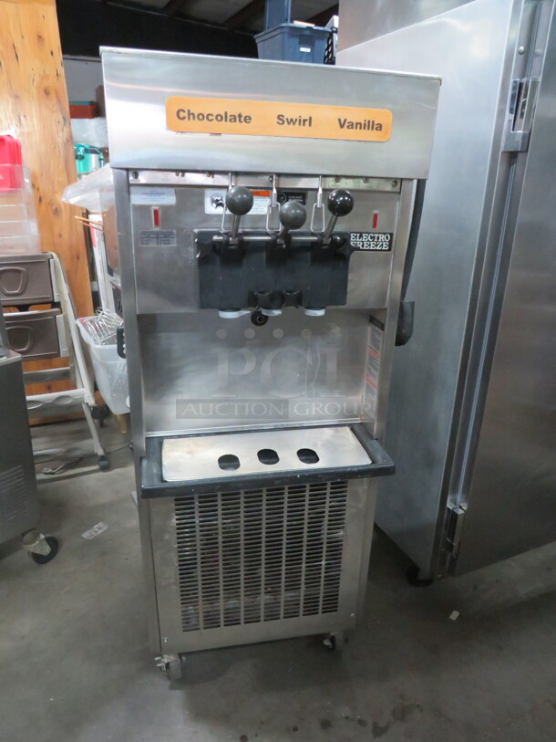 One Electro Freeze 2 Flavor Twist Ice Cream Machine On Casters. Model# SL500-232. 208-230 Volt. 3 Phase. 22X34X60