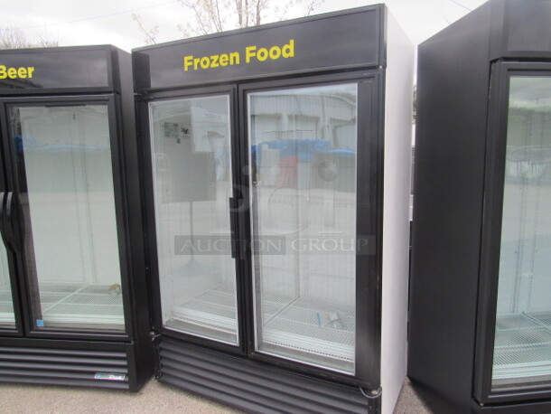 One 2 Door TRUE Freezer With 8 Racks. Model# GDM-49F. 115/208-230 Volt. 1 Phase. 54X30X78.5 Working Not Cold.