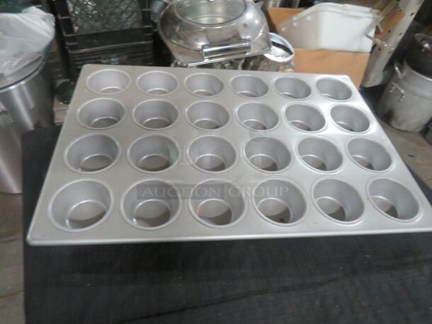 One Commercial 24 Hole Muffin Pan.
