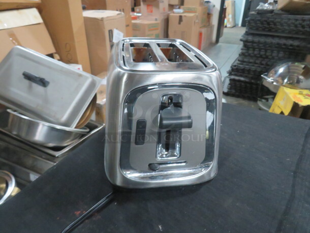 One Stainless Steel Oster 2 Slice Toaster. 120 Volt. #TSSTTRJB29.  - Image 1 of 2