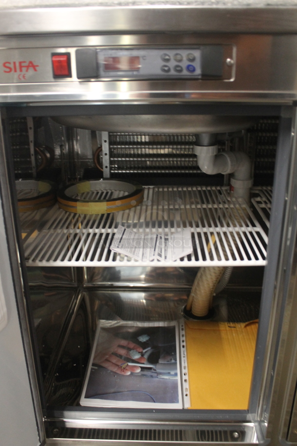 BRAND NEW SCRATCH AND DENT! Sifa Stainless Steel Commercial Work Station w/ 2 Door Cooler and Back Splash. 220-240 Volts.  - Image 8 of 11