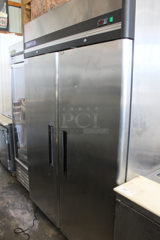 Central 69K-035 Stainless Steel Commercial 2 Door Reach In Freezer w/ Poly Coated Racks. 115 Volts, 1 Phase. Tested and Working!