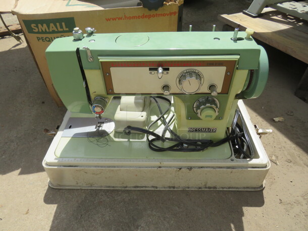 One Dressmaker Sewing Machine In Carry Case. Model# YM-43 - Item #1112429